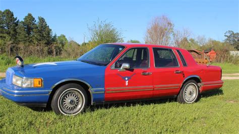 1994 Lincoln Town Car at Houston 2023 as T269 - Mecum Auctions