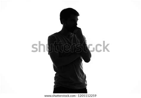 Dark Silhouette Man On Light Background Stock Photo 1205112259