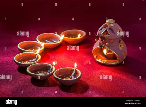 Clay Diya Lamps Lit During Diwali Celebration Greetings Card Design