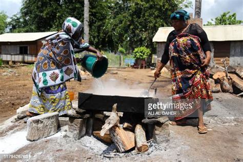 Woman Pouring Boiling Water Photos And Premium High Res Pictures