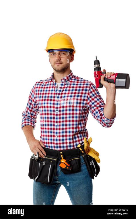 Caucasian Repairman Worker In Yellow Hard Hat Holding Cordless