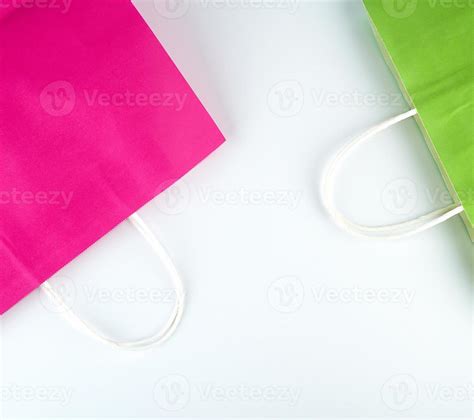 pink and green paper shopping bags 19762669 Stock Photo at Vecteezy