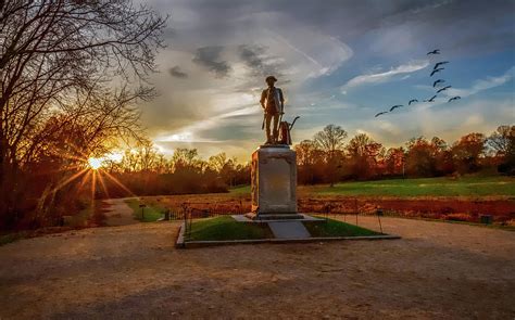 Minuteman Statue at Sunset Photograph by Larry Richardson - Pixels