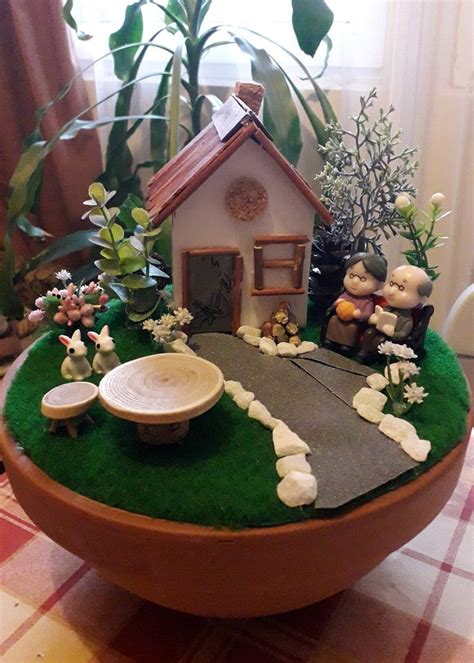 Miniature Fairy Garden with House, Flowers, and Teddy Bears