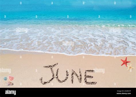 June Written On A Tropical Beach Stock Photo Alamy