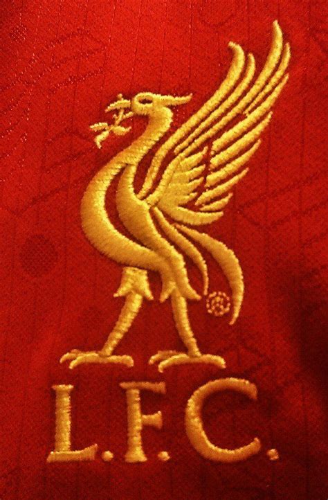 Liverpool Logo on Red Shirt with Gold Trims