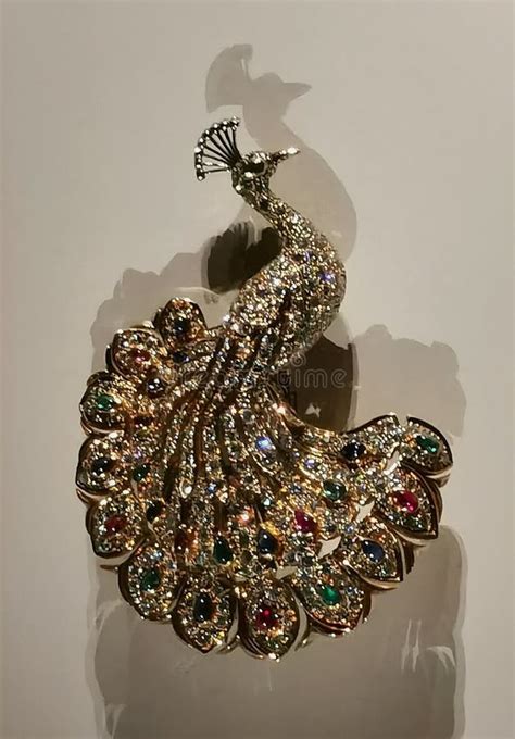 1989 Antique Cartier Jewelry Peacock Brooch Pin Design Gold Diamonds Emeralds Sapphires Rubies