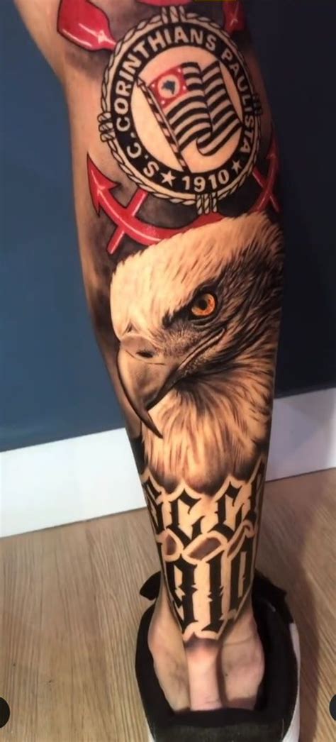 An Eagle Tattoo On The Leg Of A Person S Leg With Other Tattoos Behind It