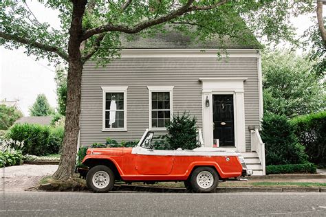 Beach Convertible Car On Street In Nantucket With House By Stocksy