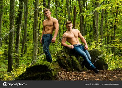 Sexy Men With Muscular Body And Bare Torso And Jeans Pants Fashion