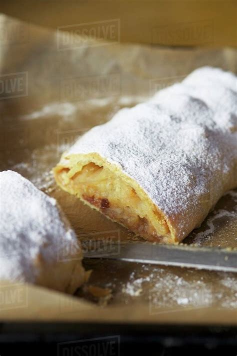 Apple Strudel Dusted With Icing Sugar Cut Open Stock Photo Dissolve