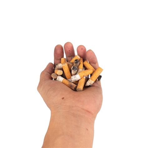 Premium Photo Hand Cigarette Butts Isolated On White Background