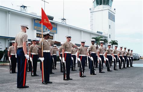 A Us Marine Corps Honor Guard Armed With M A Rifles Prepare For An