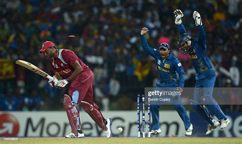 Mahela Jayawardene And Kumar Sangakkara Of Sri Lanka Celebrate After