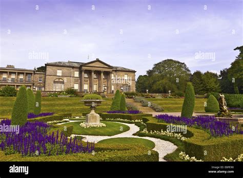 English landscaped garden and an historic neoclassical mansion Stock Photo - Alamy