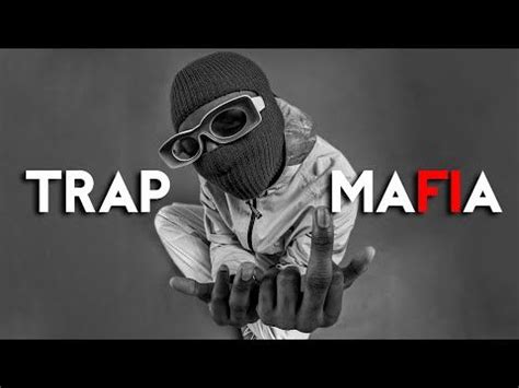 A Person Wearing A Hat And Sunglasses With The Words Trap Mafia