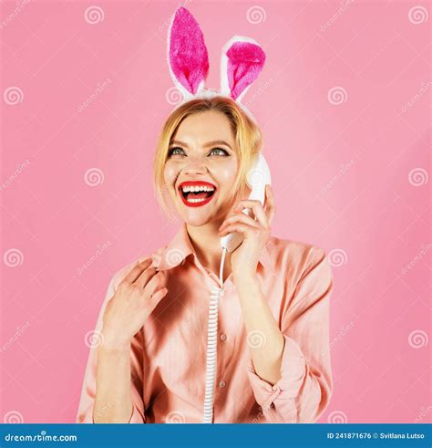 Smiling Woman In Bunny Ears Talking On Phone Easter Greetings