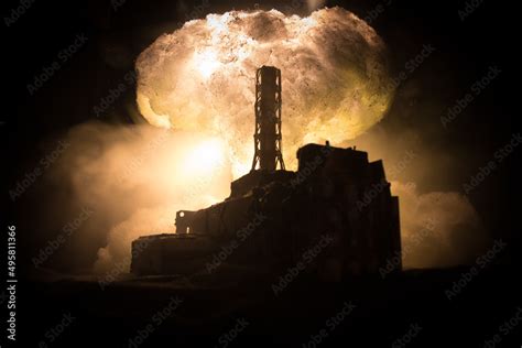 Creative artwork decoration. Chernobyl nuclear power plant at night ...