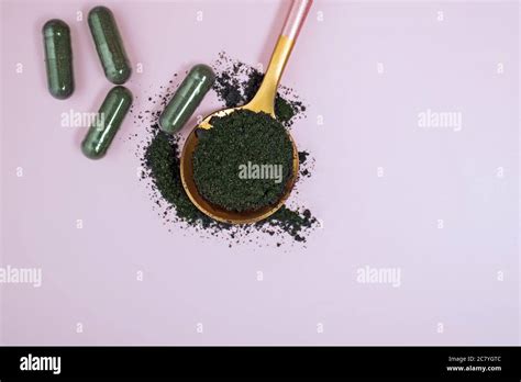 Spirulina or chlorella powder Stock Photo - Alamy