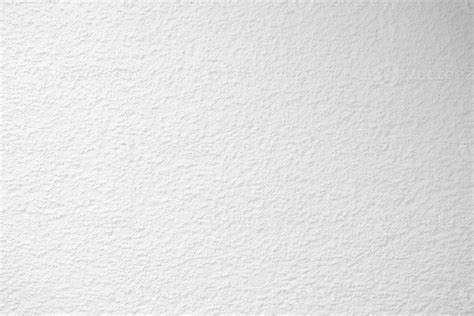 White Stucco Wall Texture Background With Light Beam On The Surface