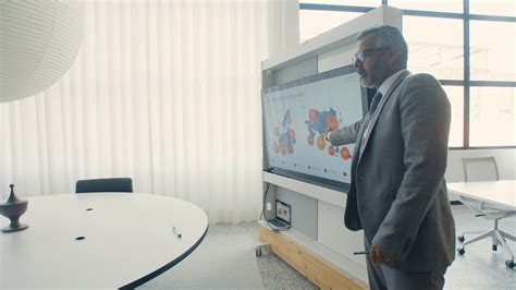 Man Wearing Black Suit in the Office · Free Stock Photo