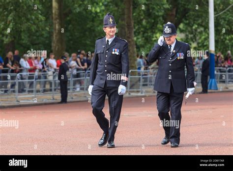 Two Senior Police Officers From The City Of London Police Left And