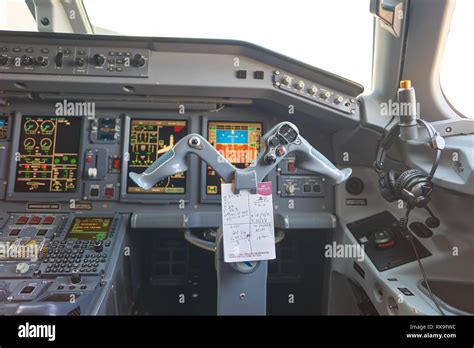 NEW YORK - MARCH 22, 2016: inside of Embraer 190 cockpit. The Embraer E ...