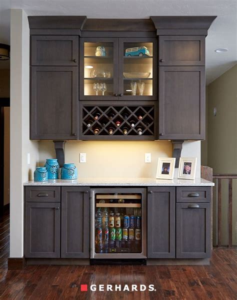 Dynesty Omega Cabinets With Wine Rack And Small Lighted Cabinet Accents