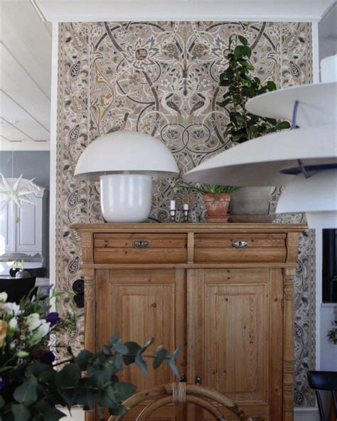 An interior with eye-catching wallpapers and signs of patina – Focal Point