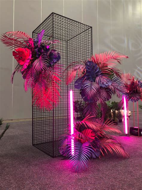 Step Into A Neon Paradise With Tropical Pink And Purple Leaves