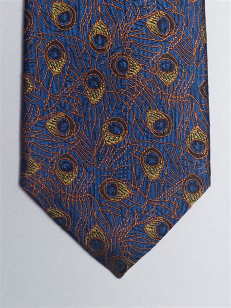 Cravate Bleue Avec Motifs Plumes De Paon Orange