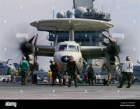 Us Navy Sailors Prepare An E C Hawkeye Assigned To The Tigertails Of