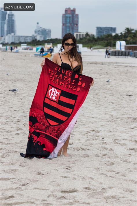 Claudia Romani Sexy Poses On South Beach In A Small Black Thong Bikini