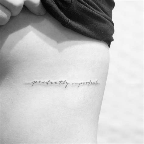 Perfectly Imperfect Lettering Tattoo On The Rib