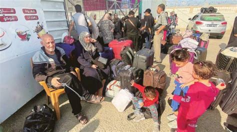 First departures from Gaza via Rafah, refugee camp hit again