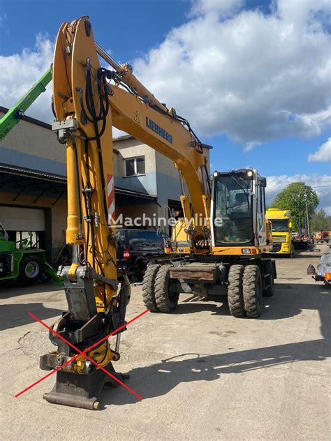 Liebherr A 904 C KOPARKA KOŁOWA PŁUG LEMIESZ wheel excavator for