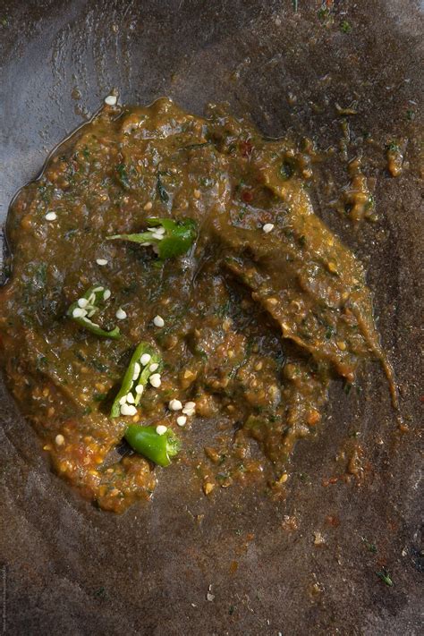 Green Chillies On A Coriander Tomato Aachar By Stocksy Contributor