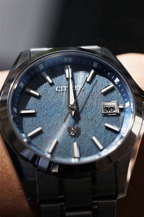 The CITIZEN AQ4091 56M クォーツ 藍染 和紙 青 文字盤 時計 シチズン 腕時計