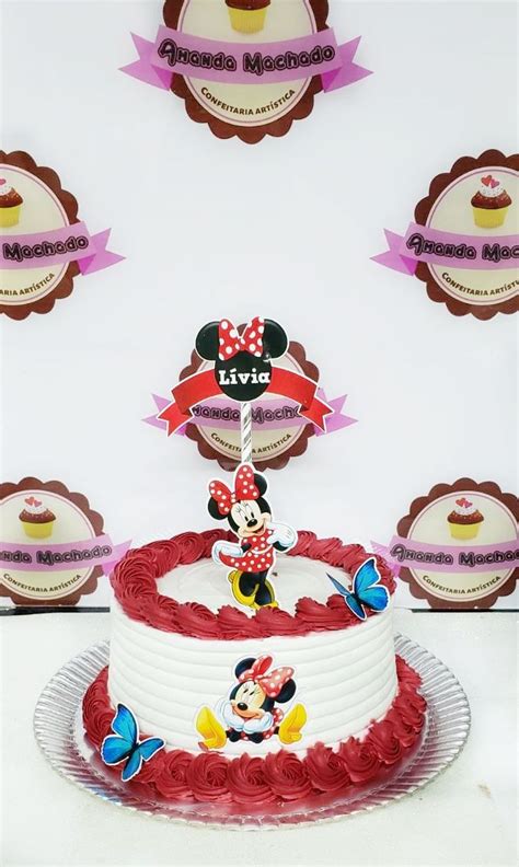 There Is A Birthday Cake With Minnie Mouse On It