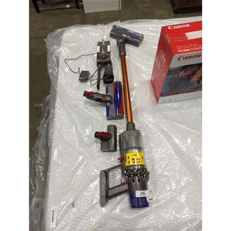 DYSON V10 ABSOLUTE VACUUM W/ CHARGER AND ACCESSORIES - TESTED AND WORKING