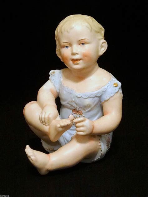 Antique German Bisque Porcelain Piano Baby Little Baby Boy Figurine In