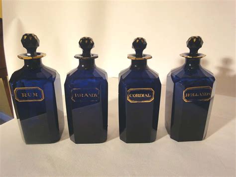 Set Of 4 Bristol Blue Glass Decanters With Original Glass Stoppers At 1stdibs