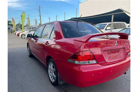 Sold Mitsubishi Lancer Es In Red Used Sedan Coopers Plains Qld