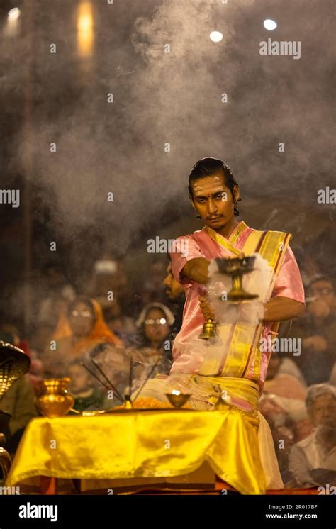 Ganga aarti, Portrait of an young priest performing river ganges ...