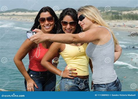 Three Beautiful Women Taking Selfie On The Beach Stock Image Image Of