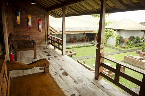 An Outdoor Area With Wooden Benches And Tables