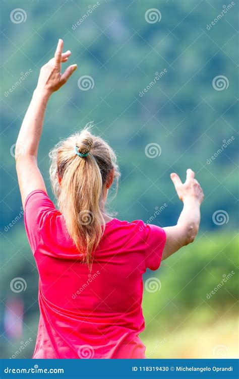 A Blonde Woman Practices Tai Chi Chuan At The Park Stock Photo Image Of Fitness Exercise