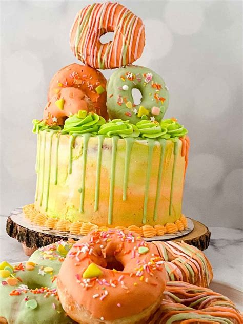 This Beautiful Donut Cake Tutorial Is Made Of A Layer Cake With Your