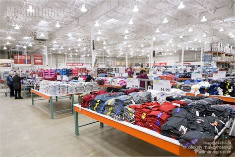 Photo of Costco Wholesale warehouse store interior clothing section | Stock Image MXI30524