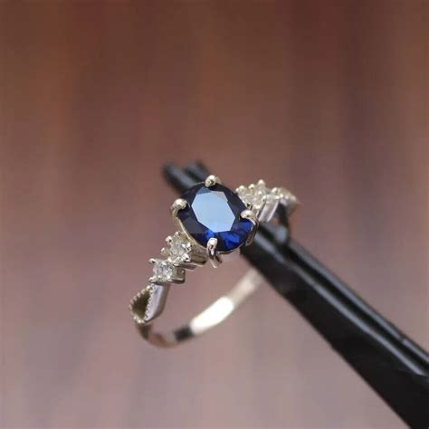 1 10 CT Oval Cut Lab Created Sapphire Women S Wedding Ring 14K White